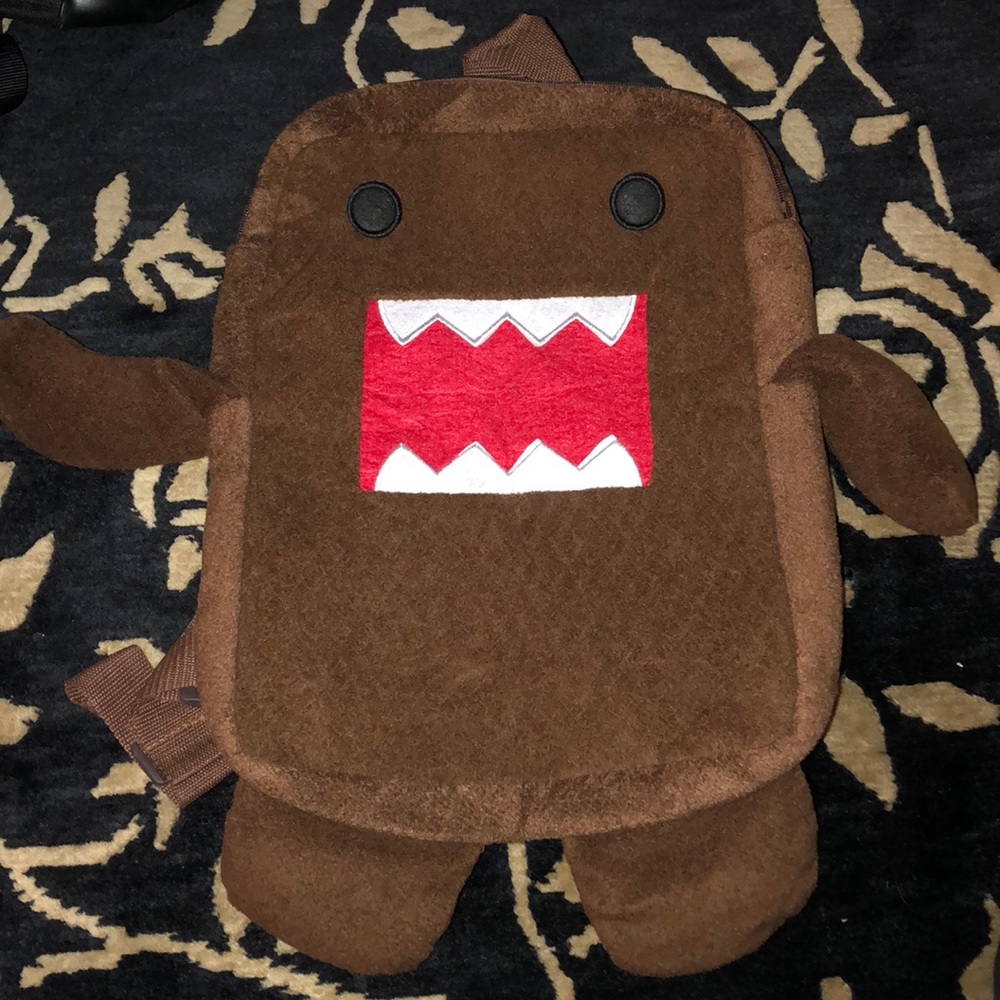 Very cool Domo soft, material backpack